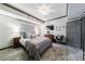 Bedroom features a decorative light fixture, shutters, and stylish accents at 2005 Westbourne Way, Alpharetta, GA 30022