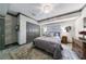 Bedroom features a decorative light fixture, and double door closet at 2005 Westbourne Way, Alpharetta, GA 30022