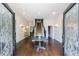 Grand foyer boasts hardwood floors, staircase, and decorative glass doors, creating an inviting entrance at 2005 Westbourne Way, Alpharetta, GA 30022