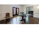 Welcoming foyer featuring dark wood floors, double-glass doors, and a stylish accent chair at 2005 Westbourne Way, Alpharetta, GA 30022