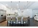 Spacious white kitchen featuring a large island with seating, stainless steel appliances, and plenty of natural light at 2005 Westbourne Way, Alpharetta, GA 30022