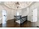 Spacious landing with dark hardwood floors, white walls, elegant trim and decorative lighting at 2005 Westbourne Way, Alpharetta, GA 30022