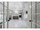 Luxurious primary bathroom with marble floors, a glass shower, and elegant fixtures at 2005 Westbourne Way, Alpharetta, GA 30022