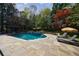 Large in-ground pool with poolside loungers, and gazebo offering a relaxing outdoor retreat at 2005 Westbourne Way, Alpharetta, GA 30022
