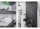 Well-organized bathroom with a modern black toilet and black shower fixtures at 3120 Godby Rd # 1118, Atlanta, GA 30349