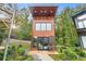 Modern home exterior showcasing a clean design, outdoor seating, and beautiful greenery at 3120 Godby Rd # 1118, Atlanta, GA 30349