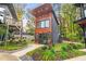Modern home exterior featuring sleek architecture, clean lines, and lush landscaping at 3120 Godby Rd # 1118, Atlanta, GA 30349