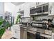 Well-equipped kitchen with stainless steel appliances, granite countertops, and bright lighting at 3120 Godby Rd # 1118, Atlanta, GA 30349