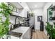Contemporary kitchen with stainless steel appliances, granite counters, and white cabinetry at 3120 Godby Rd # 1118, Atlanta, GA 30349