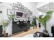 Bright and airy living room featuring stylish decor, plants, and natural light at 3120 Godby Rd # 1118, Atlanta, GA 30349