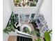 Bright, airy living room with plants, skylight and modern decor viewed from above at 3120 Godby Rd # 1118, Atlanta, GA 30349