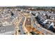 Aerial view showcasing a well-designed neighborhood with beautiful landscaping, manicured lawns, and tree-lined streets at 561 S Club Dr, Woodstock, GA 30188