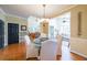 Casual dining area with hardwood floors open to other living spaces at 1201 Lake Washington Dr, Lawrenceville, GA 30043