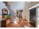 Inviting foyer featuring hardwood floors, staircase and lots of natural light at 1201 Lake Washington Dr, Lawrenceville, GA 30043