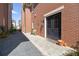 Brick home exterior with a private entry and stone walkway at 220 3Rd St, Fayetteville, GA 30214
