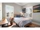 Light and airy bedroom with natural light and classic decor at 220 3Rd St, Fayetteville, GA 30214
