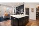 Modern kitchen island with seating and an open floorplan at 220 3Rd St, Fayetteville, GA 30214