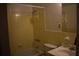 Standard yellow-tiled bathroom featuring a shower-tub combination and a single sink vanity at 300 Peachtree Ne St # 9A, Atlanta, GA 30308