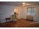 Inviting living room featuring hardwood floors and a bright window for plenty of natural light at 300 Peachtree Ne St # 9A, Atlanta, GA 30308
