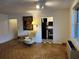 Cozy living room with hardwood floors, stylish furnishings, and a glimpse into the kitchen at 300 Peachtree Ne St # 9A, Atlanta, GA 30308