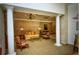 Beautifully decorated lobby with chandelier, columns, seating area, and natural light at 300 Peachtree Ne St # 9A, Atlanta, GA 30308