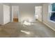 Carpeted bedroom with natural light and door entries at 2555 Flat Shoals Rd # 3405, Atlanta, GA 30349