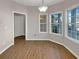 Bright dining area featuring large windows and lovely wood flooring at 2555 Flat Shoals Rd # 3405, Atlanta, GA 30349