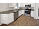 Charming kitchen featuring white cabinets, stainless steel appliances, and granite countertops at 2555 Flat Shoals Rd # 3405, Atlanta, GA 30349