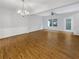 Bright open living area with hardwood floors, ceiling fan, and access to the outdoor space at 2555 Flat Shoals Rd # 3405, Atlanta, GA 30349