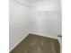 Carpeted walk-in closet with built-in shelving for storage at 2555 Flat Shoals Rd # 3405, Atlanta, GA 30349
