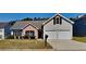 Charming single-Gathering home with a brick and vinyl facade and a well-manicured front yard at 3035 Sherbourne Dr, Lithonia, GA 30058