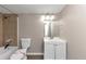 Compact bathroom with tile shower/tub and white vanity at 2780 Creekwood Ln, Lawrenceville, GA 30044