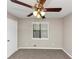 Bedroom featuring carpet, neutral walls and ceiling fan at 2780 Creekwood Ln, Lawrenceville, GA 30044