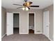 Spacious bedroom featuring neutral walls, carpet and access to an ensuite bathroom at 2780 Creekwood Ln, Lawrenceville, GA 30044