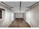 The attached garage features neutral-toned walls, and a standard garage door at 2780 Creekwood Ln, Lawrenceville, GA 30044