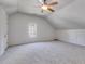 Spacious bonus room with neutral carpeting and lots of natural light at 4542 White Rd, Douglasville, GA 30135