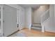 Inviting foyer with hardwood floors and staircase, creating a warm and welcoming entrance at 4542 White Rd, Douglasville, GA 30135