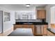 Kitchen area featuring granite countertops, a stainless steel dishwasher, and a sink at 4542 White Rd, Douglasville, GA 30135