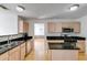 Modern kitchen with granite countertops and stainless steel appliances, perfect for cooking and entertaining at 4542 White Rd, Douglasville, GA 30135