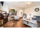 Inviting living room with hardwood floors, arched doorways, and stylish furniture arrangement at 817 Nevis Way, Mcdonough, GA 30253