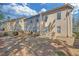 Well-maintained backyard featuring a cozy patio and mature trees at 2983 Bancroft Nw Gln, Kennesaw, GA 30144