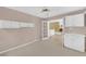 Cozy home office space featuring built-in cabinets and French doors at 2983 Bancroft Nw Gln, Kennesaw, GA 30144