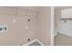 Laundry room features space for washer/dryer, cabinets, counter, and overhead shelving at 2983 Bancroft Nw Gln, Kennesaw, GA 30144