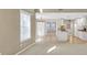 Open concept living room and kitchen with neutral tones and ample natural light at 2983 Bancroft Nw Gln, Kennesaw, GA 30144