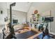 Well-lit home gym boasting high ceilings and a variety of fitness equipment and natural light at 5489 White Cedar Ter, Sugar Hill, GA 30518