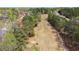 Scenic aerial shot of a golf course community with lush trees and well-manicured lawns at 6317 Southland Forest Dr, Stone Mountain, GA 30087