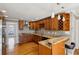 Traditional kitchen with hardwood floors, granite countertops, stainless steel appliances and bar seating at 6317 Southland Forest Dr, Stone Mountain, GA 30087