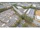 An aerial view showcases a well-maintained community near shopping, dining, and major roadways at 3826 Dandridge Way, Duluth, GA 30096