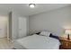 Clean bedroom featuring wood-look flooring and a double door closet at 3826 Dandridge Way, Duluth, GA 30096