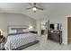 Bedroom with a lighted headboard, TV, and a door to the bathroom at 3826 Dandridge Way, Duluth, GA 30096
